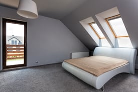 Urban apartment - modern bedroom on the attic.jpeg