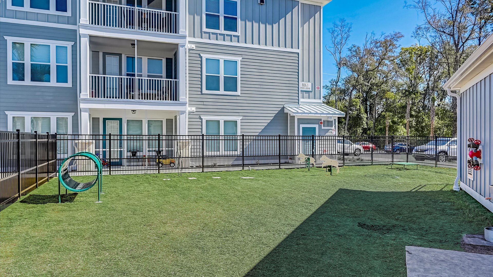 Large dog park amenity for small and large dogs Springs at Flagler Center Apartments in Jacksonville, FL