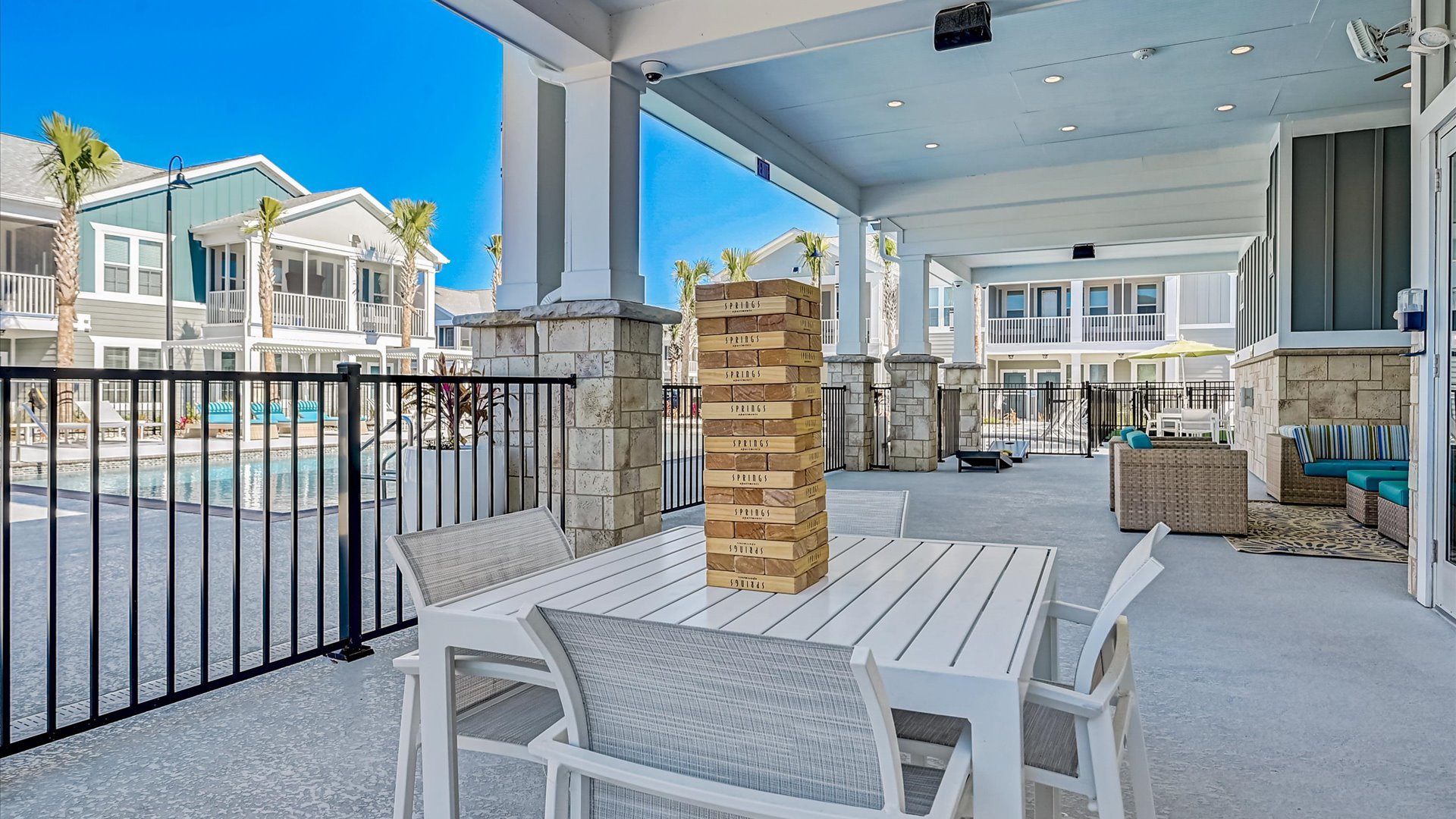 Jenga By the Pool Amenity for Free at Springs at Flagler Center Apartments in Jacksonville, FL