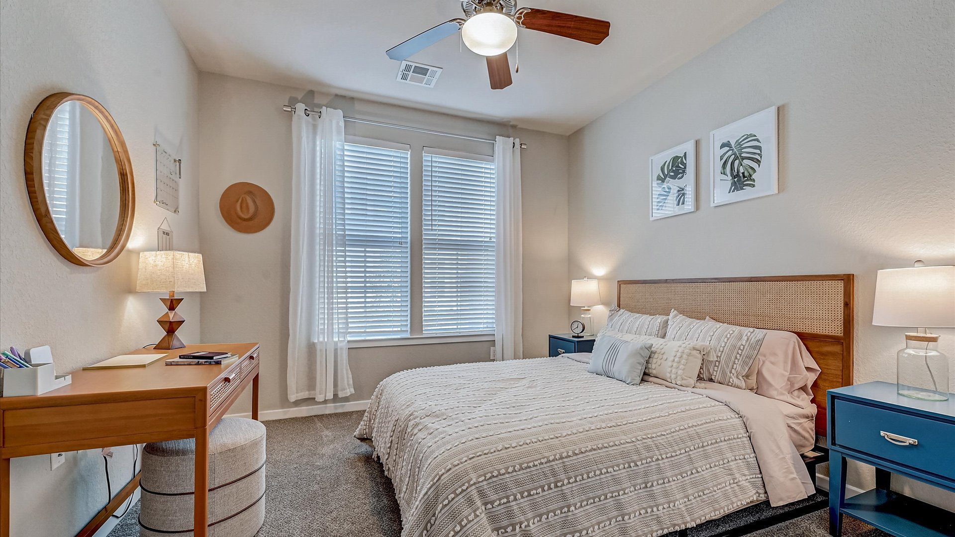 Large Bedroom with Tall Ceilings, an Office table, and large windows at Springs at Flagler Center Apartments in Jacksonville, FL