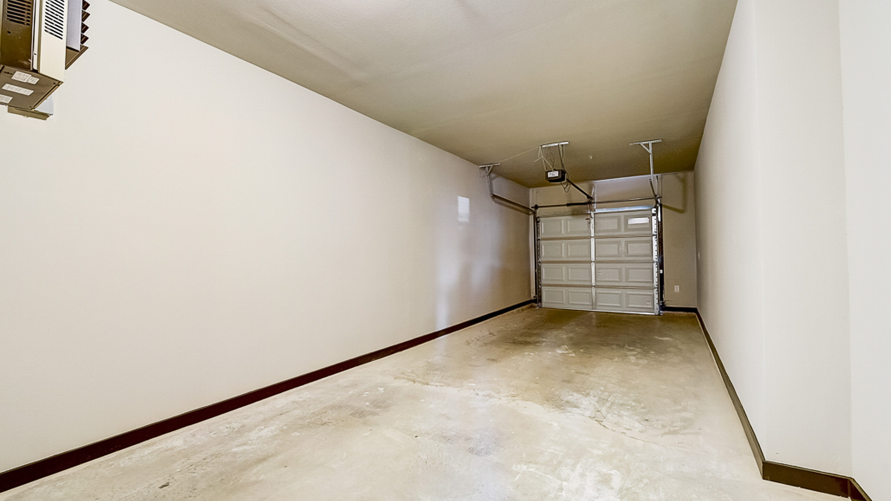 Attached garage options at Springs at Grand Prairie apartments-35