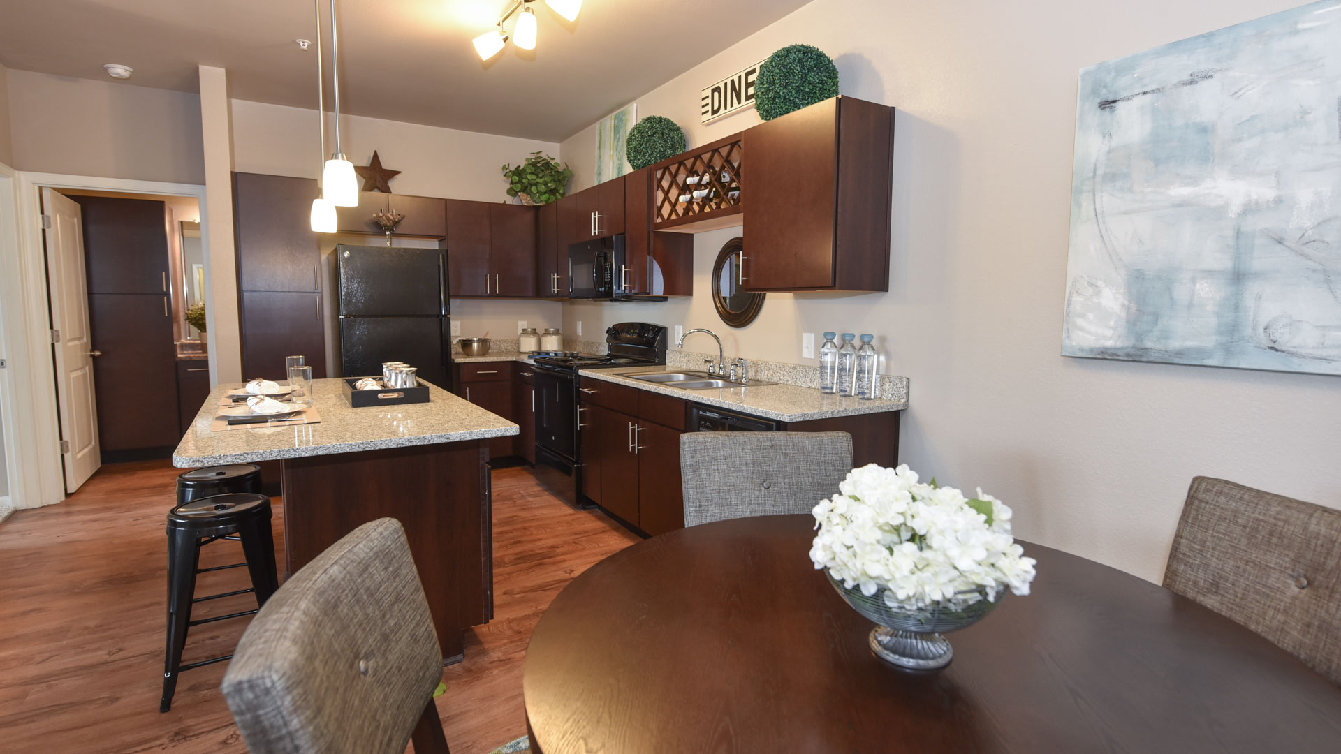 Dining Area Next To Kitchen at Springs at Orchard Road in North Aurora, IL-57