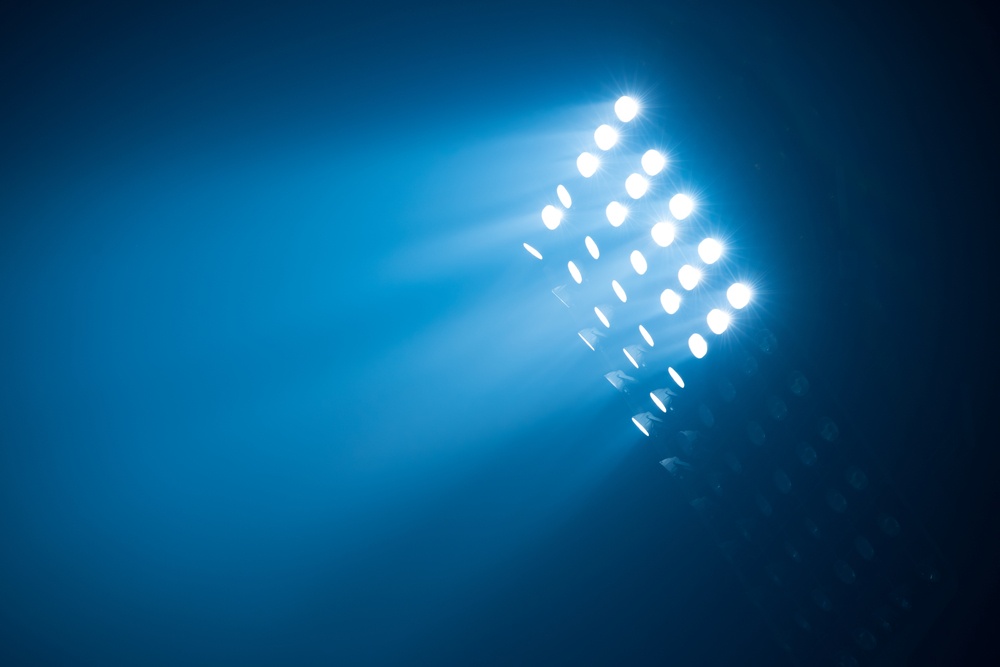 soccer stadium lights reflectors against black background.jpeg