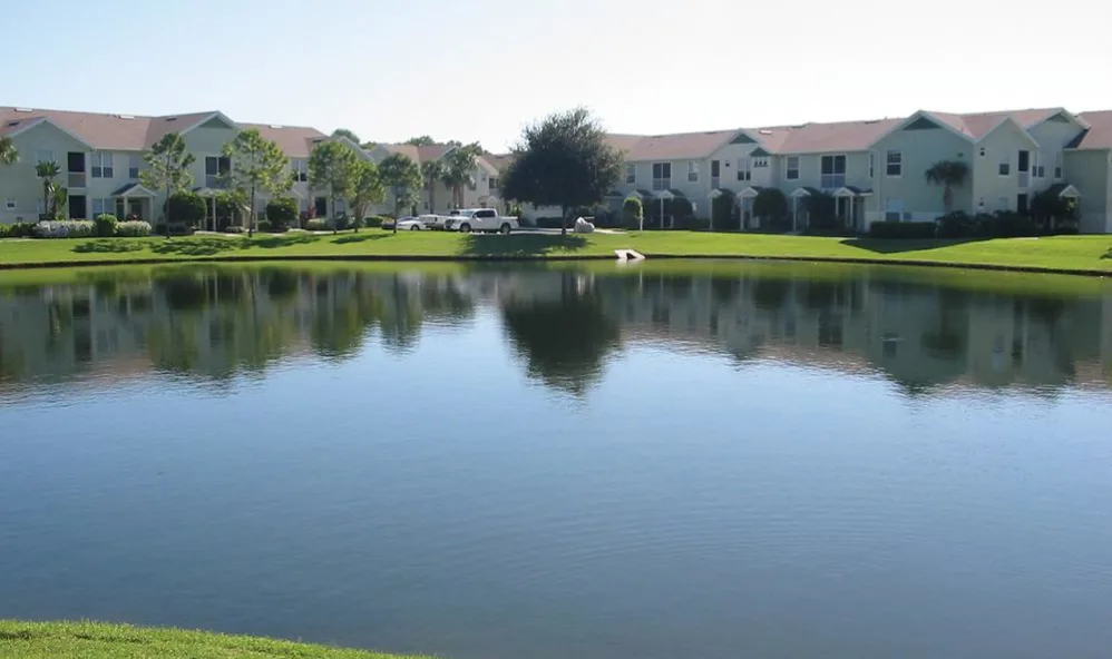 Springs at Palma Sola community view across pond - Bradenton, FL