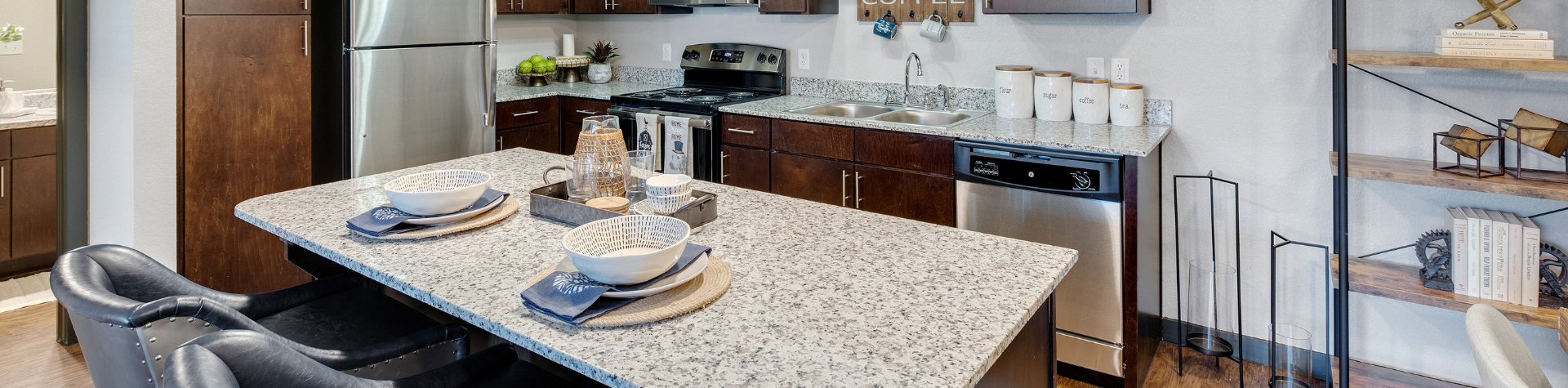 Luxury kitchen at Springs at Lakeline featuring granite counter tops and premium finishes.
