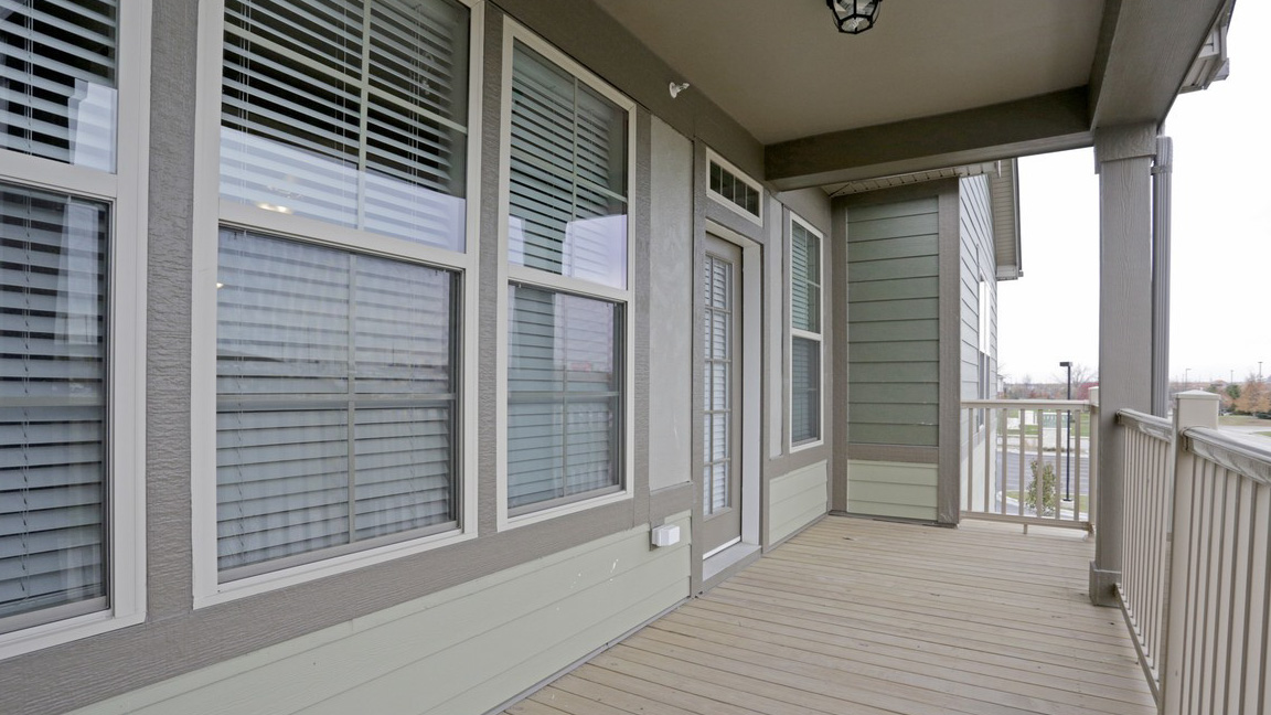 Private Deck outside apartment in Romeoville, IL at Springs at Weber Road-23