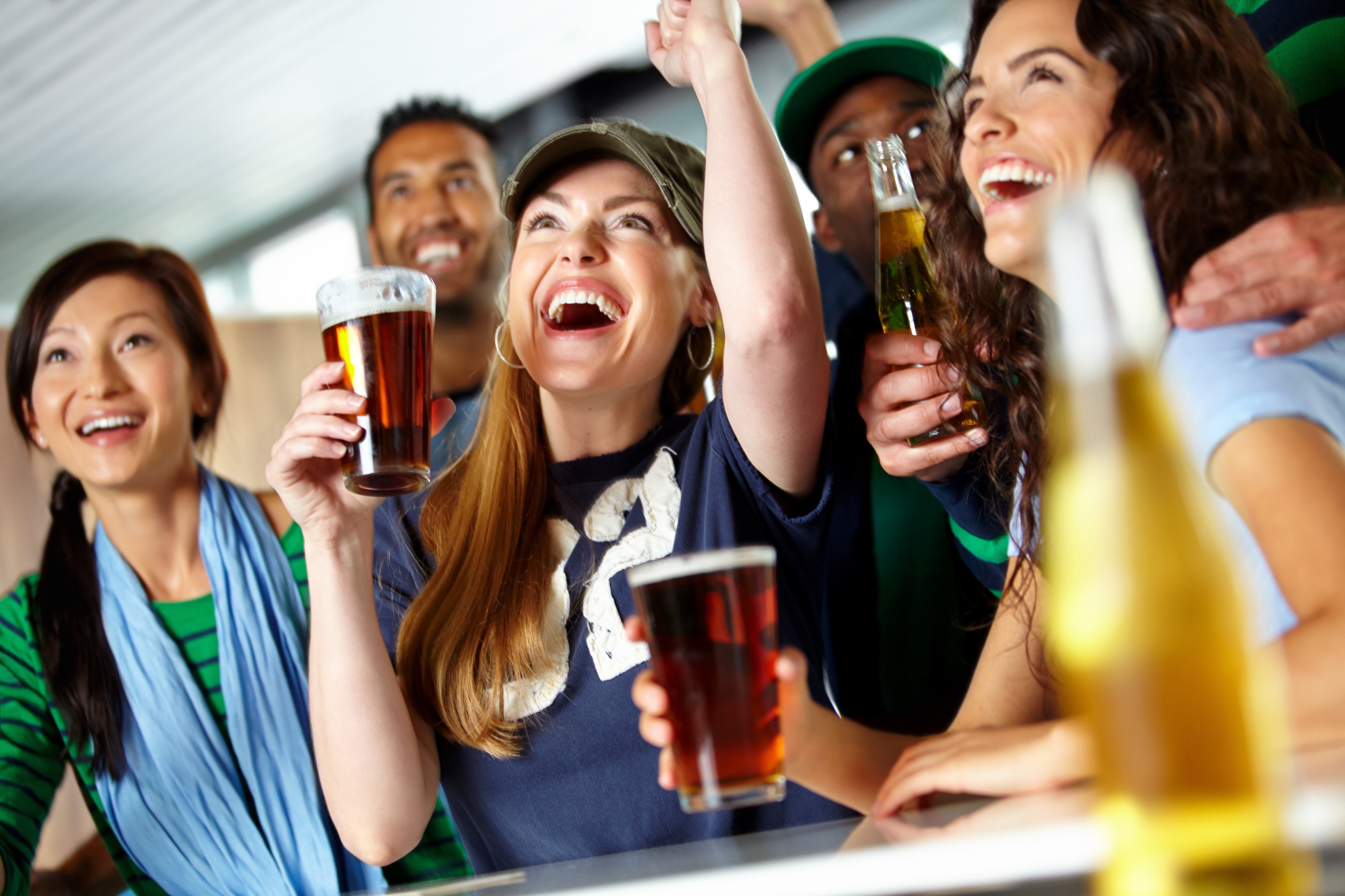fans-cheering-at-a-sports-bar